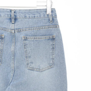 Distressed denim pants