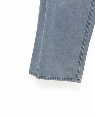 Wide-leg denim with side pleats