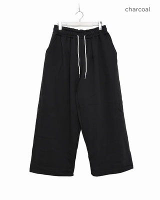 Fleece-lined one-pleat sweatpants