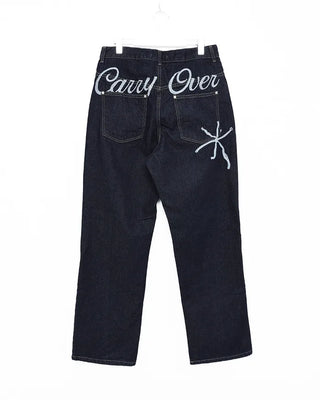 Back lettering denim pants