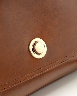 Gold button shoulder bag