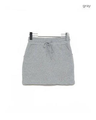 Shoulder-cut top & skort sweatpants