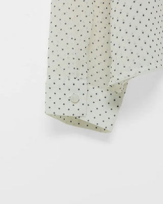 See-through polka dot tie blouse