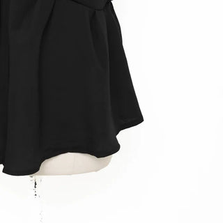 Asymmetrical design top