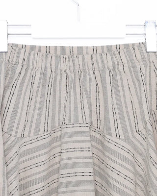 Unique strap cut-off midi skirt