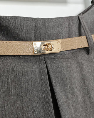 Belted pleated mini skirt