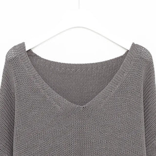 Distressed long knit sweater