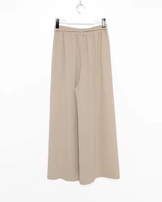Two-button strap slacks
