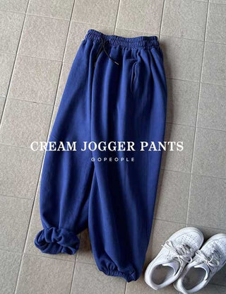 Cream side-slit jogger pants (cotton fabric)