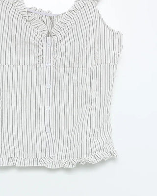 Frilled hem sleeveless blouse