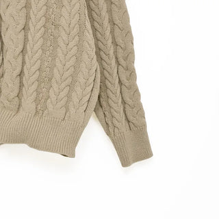 Loose-fitting cable knit round neck sweater