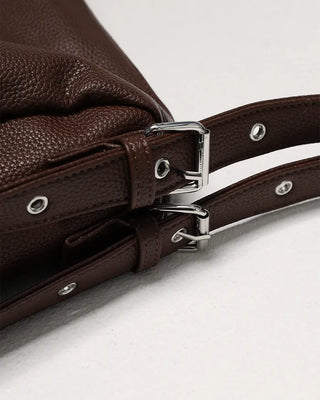 Drape-form buckle shoulder bag