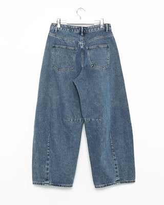 Pointed denim pants with contrasting panels