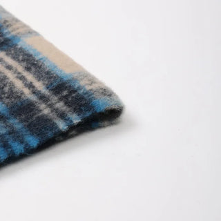 Checkered tassel muffler