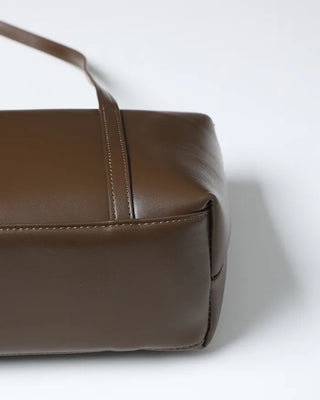 Slide pocket shoulder bag
