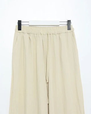 Frilled sleeveless top and wide-leg pants set