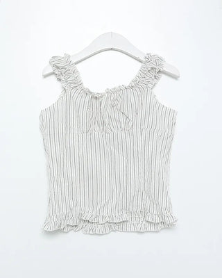 Frilled hem sleeveless blouse