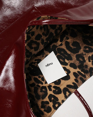 Leather leopard reversible eyelet one-shoulder bag