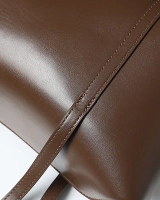 Slide pocket shoulder bag