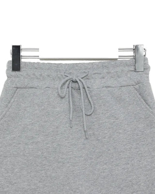 Shoulder-cut top & skort sweatpants