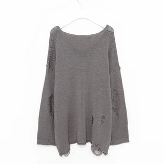 Distressed long knit sweater