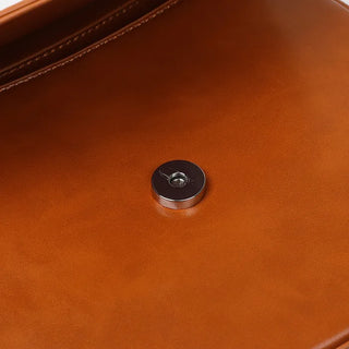 Round flap shoulder bag