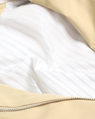Loose-fit cape short trench coat