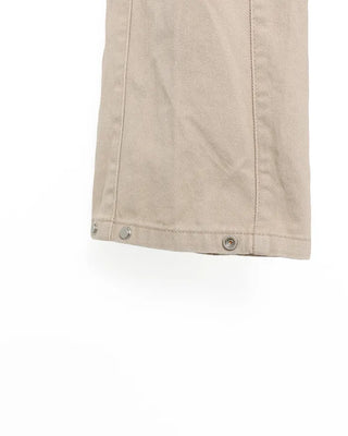 Side-tucked white cotton pants