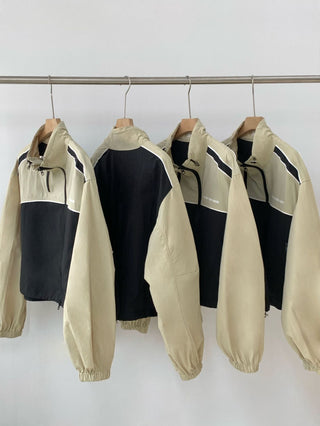 Asymmetric windbreaker jacket