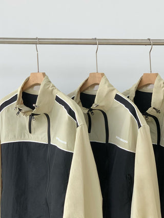 Asymmetric windbreaker jacket