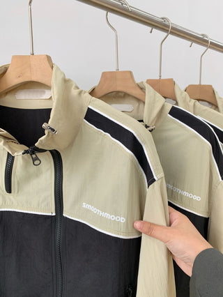 Asymmetric windbreaker jacket