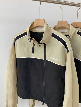 Asymmetric windbreaker jacket