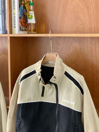 Asymmetric windbreaker jacket