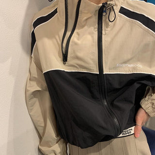 Asymmetric windbreaker jacket