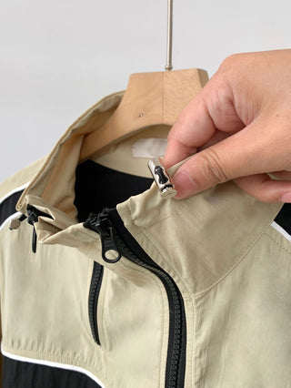 Asymmetric windbreaker jacket