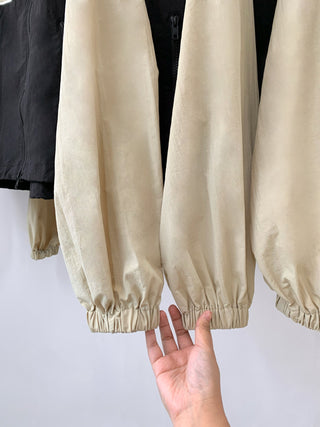 Asymmetric windbreaker jacket