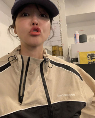 Asymmetric windbreaker jacket