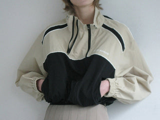 Asymmetric windbreaker jacket