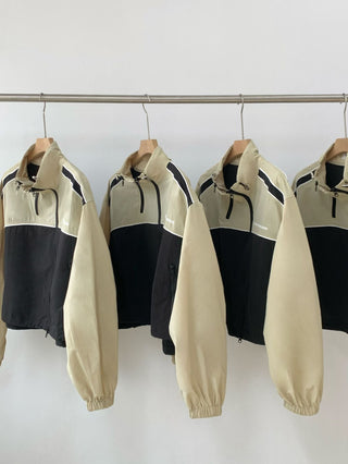 Asymmetric windbreaker jacket