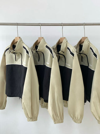 Asymmetric windbreaker jacket