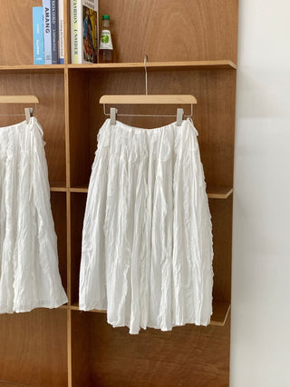 Pleated lace skirt
