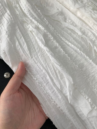 Pleated lace skirt