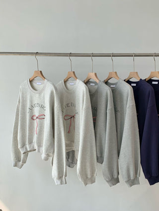 Bow print sweater
