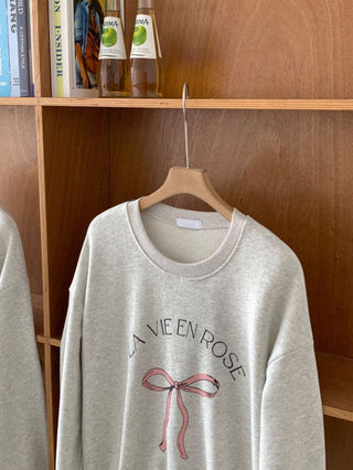 Bow print sweater