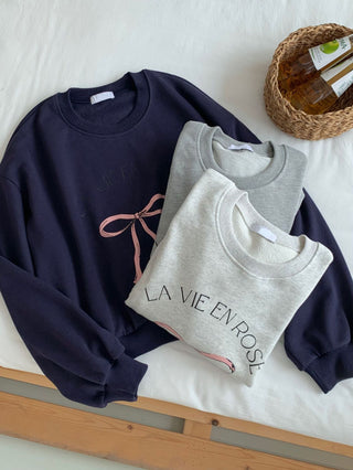 Bow print sweater