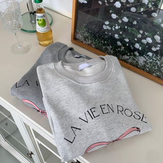 Bow print sweater