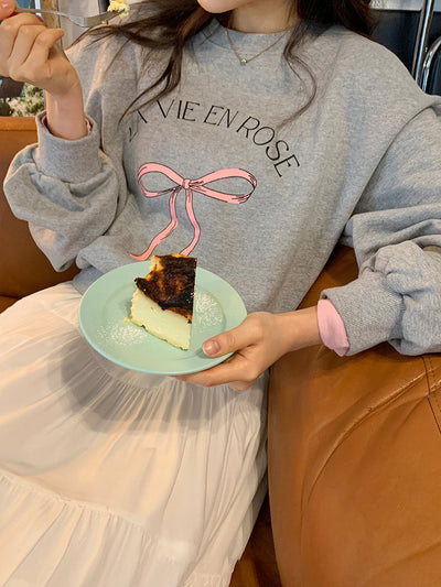 Bow print sweater