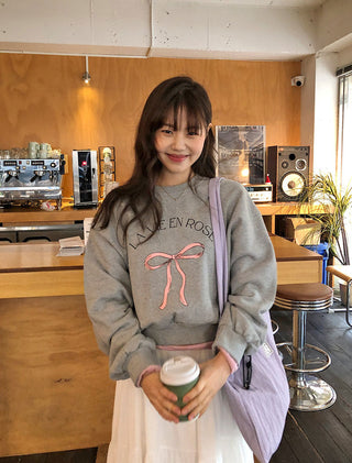 Bow print sweater