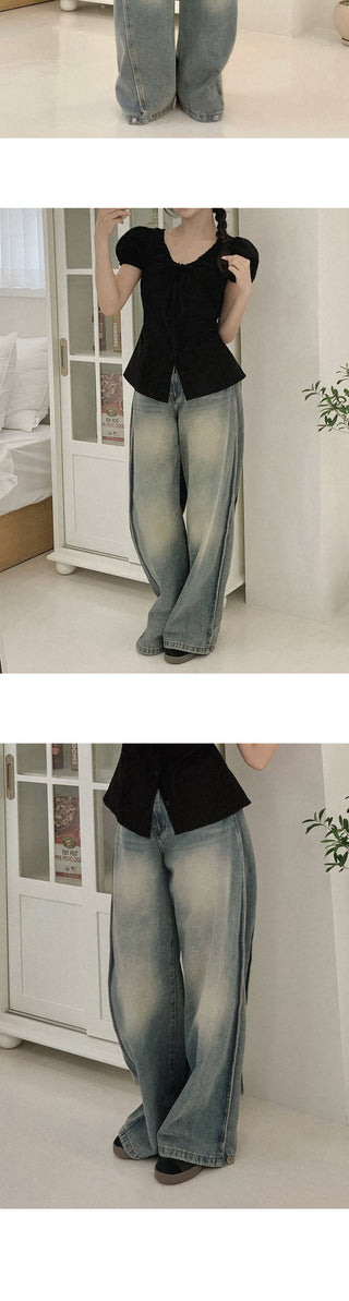 Washed wide-leg pants with side pleats