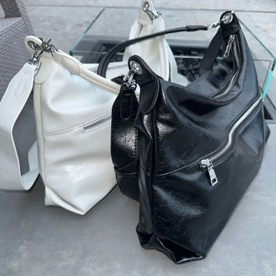 Double zipper shoulder